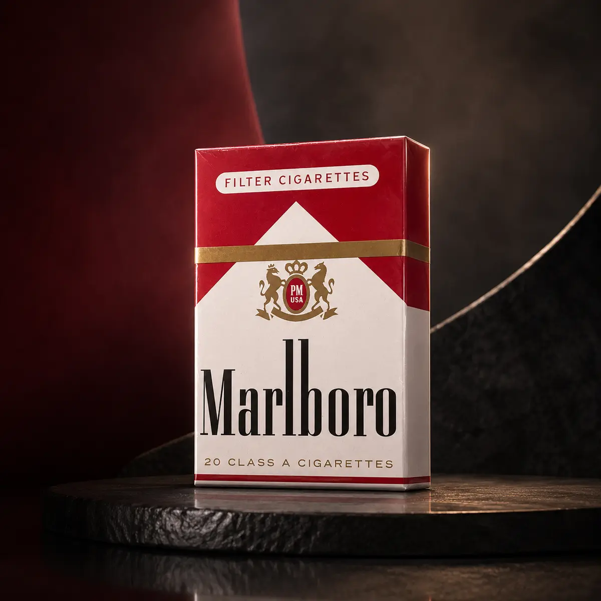 Marlboro Red unopened retail package on a dark red studio set